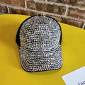 Macro shot of black baseball cap fully covered in sparkling silver rhinestones on yellow background - Adjustable / Silver Black