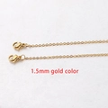 Detailed macro view of 1.5mm gold-colored stainless steel chain with lobster clasps - 45cm / 1.5mm Gold Color