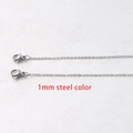 Macro shot of 1mm stainless steel square link chain with dual lobster clasps in steel color - 45cm / 1mm Steel Color