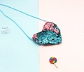 Detail of heart-shaped sequin crossbody bag with reversible pink and blue scales - Blue + Light Pink