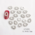 Silver teardrop nail charm with rhinestones and LF1835 model on red manicure - Silver White Rhinestone Teardrop Style (1835)