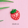 DIY strawberry resin charm accessory for earrings and phone cases on pink texture cloth - Red Glitter Strawberry
