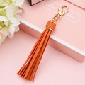 Bright orange PU leather tassel keychain with a golden metal lobster clasp variant - Orange