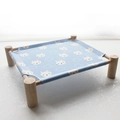 Elevated wooden pet bed with a breathable blue canvas featuring cute white rabbit patterns - Blue Small Rabbit