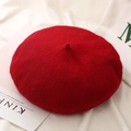Chic red wool beret pumpkin hat for women displayed on elegant white fabric - One Size / Red