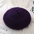 Detailed texture of dark purple wool blend beret hat with classic top tail detail - One Size / Deep purple