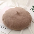 Detailed close-up of a warm camel wool blend beret featuring a stylish top stem accent - One Size / Khaki