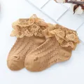 Detailed view of baby girl cotton socks with double-layered lace trim and hollow knit design - Brown / 9-12cm(6-12 Months)