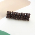 Detail of cute brown resin gummy bears hair clip with silver metal alligator base - Coffee
