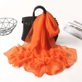 Bright orange chiffon long scarf for women with elegant drape on a leather handbag - Orange