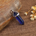 Blue hexagonal crystal point pendant necklace with a silver metal clasp on a rustic base - Royal Blue Crystal