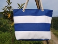 Detail of blue and white striped canvas tote bag with thick rope handles and metal eyelets - Royal Blue