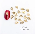 Golden heart-shaped nail charm LF1865 with three central rhinestones, 5.6x6.3mm size - Gold White Rhinestone Heart Style (1865)