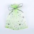Close-up of light green organza gift bag with silver star patterns and drawstring - 9x12cm / Cyan