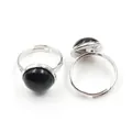 Macro detail of adjustable silver ring with round black onyx stone on white background - Adjustable Open / Black Agate
