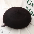 Close-up of wool texture and decorative stalk on stylish dark brown beret hat - One Size / Coffee