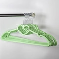 Mint green heart-shaped plastic hangers with non-slip notches and metal hooks - Green Heart Shape