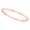 Detailed view of a 4mm pink strawberry quartz beaded bracelet with translucent texture - Watermelon red