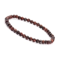 Detailed close-up of 4mm red tiger eye stone beads on a polished elastic beaded bracelet - Red Tiger Eye