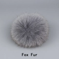 Premium grey fox fur pompom for hats and accessories featuring natural soft texture - Fox Fur / Light Gray