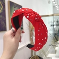 Red twisted knot headband featuring elegant white pearls and silver rhinestones - Red