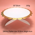 White 33.5cm round cardboard cake stand with gold scalloped edges and X-shaped base - White