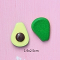 Flat lay macro of resin avocado charms for DIY earrings and jewelry, size 1.9x2.5cm - Avocado Flesh