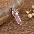 Natural rose quartz hexagonal prism pendant necklace with silver metal clasp on stone background - Rose Quartz