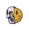 Detailed close-up of high-quality skull and smiley face enamel brooch on white background - Half Skull Half Smile (XZ2145)