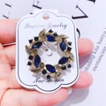 Vintage gold wreath brooch with marquise-cut navy blue gems and sparkling rhinestones - G6 Garland Circle 02