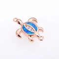 Detail of rose gold turtle charm with blue opal shell and small zircon accents - Rose Gold Plated Blue Opal Turtle (Connector)