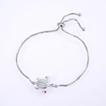 Detailed close-up of a silver turtle bracelet with opal inlay and adjustable box chain - White Gold Plated White Opal Turtle Bracelet