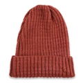 Close-up of rust red ribbed knit beanie showing soft wool texture and wide folded cuff - Caramel color