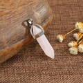 Pink quartz hexagonal point pendant necklace with silver clasp on natural wood setting - Rose Quartz