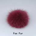 Close-up of fluffy dark pink fox fur pompom showing soft texture and premium quality - Fox Fur / Burgundy