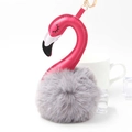 Detailed shot of pink flamingo plush keychain with grey pompom and golden keyring - Light Gray