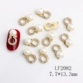 Golden nail art charm featuring white oval pearl and sparkling rhinestone border - Gold Clear Rhinestone White Pearl Style (2082 Iridescent Pink)