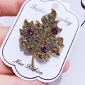 Elegant maple leaf brooch with multi-colored rhinestones on golden alloy base - G3 Maple Leaf