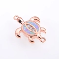 Detailed macro view of rose gold turtle connector with opal shell and zircon stones - Rose Gold Plated Pink Opal Turtle (Connector)