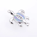 Macro detail of silver turtle connector with blue opal inlay and sparkling zircons - White Gold Plated Pink Opal Turtle (Connector)