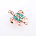 Macro shot of rose gold sea turtle charm with green opal shell and cubic zirconia accents - Rose Gold Plated Green Opal Turtle (Connector)