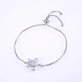 Detailed view of turtle bracelet with opal shell and sparkling cubic zirconia stones - White Gold Plated Pink Opal Turtle Bracelet