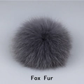 Macro shot of fluffy dark grey fox fur pom pom with soft texture and clear hair details - Fox Fur / Dark Gray