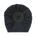 Close-up view showing the soft pleated texture of a black donut turban knot hat - One Size / Black