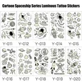 Luminous space tattoos for boys featuring astronauts, rockets, and UFOs in 10 styles - Luminous Space Set (10 Sheets)