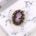 Vintage style oval cameo brooch with purple female portrait and bronze rhinestone frame - Purple
