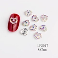 Macro detail of 8x7mm silver hollow heart nail art charms with iridescent rhinestones - LF2017 Silver Aurora Rhinestone Framed Heart