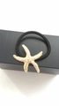 Golden starfish hair tie with metallic texture and black elastic band for women - Gold