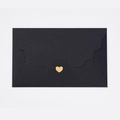 Matte black pearlescent envelope with scalloped edges and a gold heart seal closure - Black
