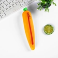 Cute silicone carrot pencil case in bright orange with green leaves and red zipper - Carrot